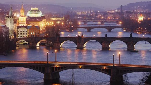 Dusk settles on bridges spread across the Moldau river in central Prague, Czech Republic. Austrian composer Wolfgang Amadeus Mozart stayed and composed in Prague on several occasions between 1787 and 1791, where he premiered his operas ‘Don Giovanni’ and ‘La clemeza di Tito.’ (Sean Gallup / Getty Images) Dusk settles on bridges spread across the Moldau river in central Prague, Czech Republic. Austrian composer Wolfgang Amadeus Mozart stayed and composed in Prague on several occasions between 1787 and 1791, where he premiered his operas ‘Don Giovanni’ and ‘La clemeza di Tito.’ (Sean Gallup / Getty Images)