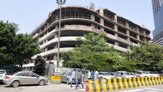 Work on the Sector 18 parking facility started on July 22, 2013, with a July 2015 deadline.(Sunil Ghosh/HT Photo) Work on the Sector 18 parking facility started on July 22, 2013, with a July 2015 deadline.(Sunil Ghosh/HT Photo)
