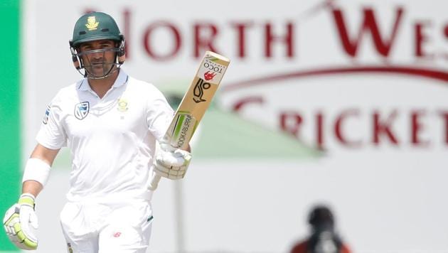 South African batsman Dean Elgar raises his bat as he celebrates scoring his century during the first day of the first Test against Bangladesh on Thursday in Potchefstroom.(AFP)