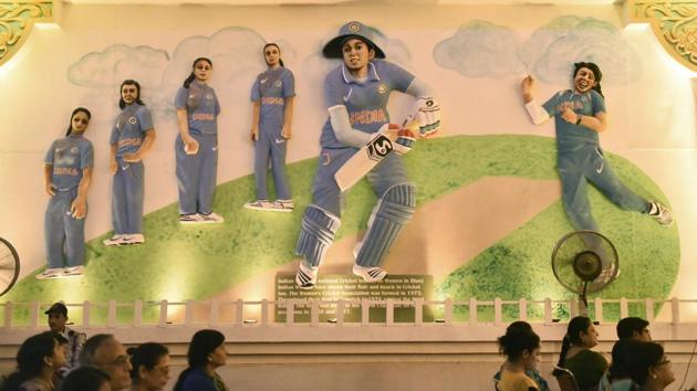 Members of the Indian women’s cricket team are seen personified as murals in line with Safdarjang Enclave Kali Bari’s Women’s Empowerment theme during this year’s Durga Puja festivities. (Burhaan Kinu / HT Photo)