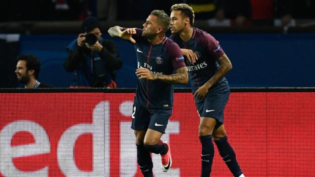 Neymar and his Paris Saint-Germain teammate Dani Alves celebrate after scoring against Bayern Munich in an UEFA Champions League match. (AFP) Neymar and his Paris Saint-Germain teammate Dani Alves celebrate after scoring against Bayern Munich in an UEFA Champions League match. (AFP)