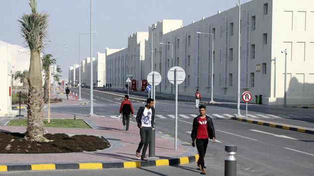 FILE PHOTO: Migrant workers walk at Labor City, Qatar, January 13, 2016. REUTERS/Stringer/File Photo(REUTERS)