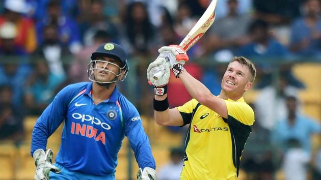 David Warner in action during the 4th One Day International between Indian cricket team and Australia cricket team at the M Chinnaswamy Stadium in Bangalore on Thursday.(PTI)