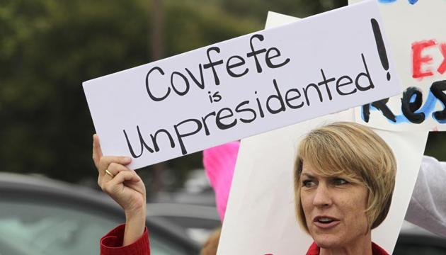 Demonstrator Annette Lievers carries a sign concerning a Donald Trump tweet. Let Modi and Trump tweet as much as they want, when I decide to blow my trumpet not only would I want an orchestra in accompaniment but an audience that sits spellbound before it rises to its feet in applause. Till then, mum’s the word. (AFP) Demonstrator Annette Lievers carries a sign concerning a Donald Trump tweet. Let Modi and Trump tweet as much as they want, when I decide to blow my trumpet not only would I want an orchestra in accompaniment but an audience that sits spellbound before it rises to its feet in applause. Till then, mum’s the word. (AFP)