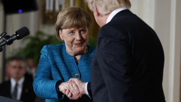President Donald Trump shakes hands with German Chancellor Angela Merkel during a news conference in the East Room of the White House, Friday, March 17, 2017, in Washington.(AP File Photo)