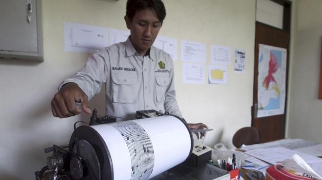 Disaster officials recorded over 800 volcanic earthquakes on Wednesday. Warning sirens were installed in several townships this week. Indonesia is located on the Pacific ‘Ring of Fire,’ an arc of volcanoes and fault lines, prone to seismic upheaval. ‘It could continue for the next few days or weeks, but an eruption could also happen any time given its condition is very critical,’ said Gede Swantika, head of volcanology at Indonesia’s Center for Volcanology and Geological Disaster Mitigation. (Firdia Lisnawati / AP) Disaster officials recorded over 800 volcanic earthquakes on Wednesday. Warning sirens were installed in several townships this week. Indonesia is located on the Pacific ‘Ring of Fire,’ an arc of volcanoes and fault lines, prone to seismic upheaval. ‘It could continue for the next few days or weeks, but an eruption could also happen any time given its condition is very critical,’ said Gede Swantika, head of volcanology at Indonesia’s Center for Volcanology and Geological Disaster Mitigation. (Firdia Lisnawati / AP)