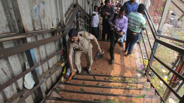 Police security after a stampede broke out at the Elphinstone railway station bridge on Friday morning in Mumbai.(Bhushan Koyande/HT)