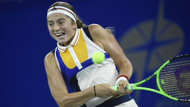 Jelena Ostapenko hits a return against Maria Garbine Muguruza during their women's singles quarter-final at the WTA Wuhan Open. (AFP) Jelena Ostapenko hits a return against Maria Garbine Muguruza during their women's singles quarter-final at the WTA Wuhan Open. (AFP)