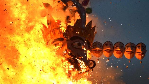 The effigy of demon god Ravana being burnt on the occasion of Dussehra in Chandigarh on Saturday. (Sanjeev Sharma/HT) The effigy of demon god Ravana being burnt on the occasion of Dussehra in Chandigarh on Saturday. (Sanjeev Sharma/HT)