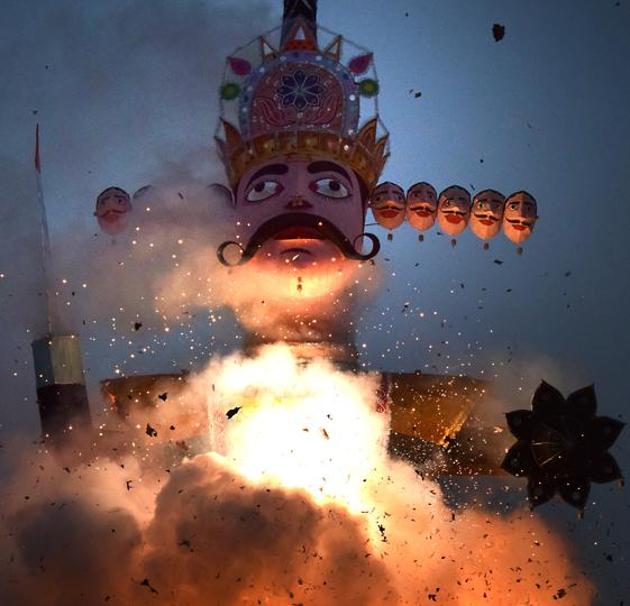 The effigy of demon god Ravana being burnt on the occasion of Dussehra in Chandigarh on Saturday. (Sanjeev Sharma/HT) The effigy of demon god Ravana being burnt on the occasion of Dussehra in Chandigarh on Saturday. (Sanjeev Sharma/HT)