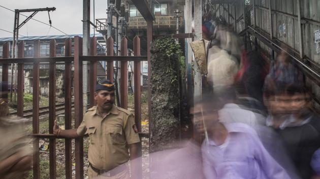 A rush hour stampede during a sudden monsoon downpour killed at least 22 people and wounded more than 30 on Friday at Mumbai’s Elphinstone Road station. (Satish Bate / HT Photo) A rush hour stampede during a sudden monsoon downpour killed at least 22 people and wounded more than 30 on Friday at Mumbai’s Elphinstone Road station. (Satish Bate / HT Photo)