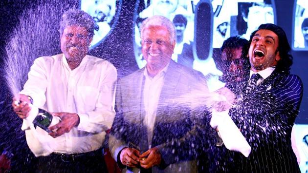 Indian Bollywood actor Ranveer Singh (R) celebrates with former Indian cricketers Kapil Dev (L) and Madan Lal (C) during the announcement of the upcoming sports drama Hindi film '1983 World Cup' in Mumbai, Maharashtra on September 27, 2017. (AFP) Indian Bollywood actor Ranveer Singh (R) celebrates with former Indian cricketers Kapil Dev (L) and Madan Lal (C) during the announcement of the upcoming sports drama Hindi film '1983 World Cup' in Mumbai, Maharashtra on September 27, 2017. (AFP)