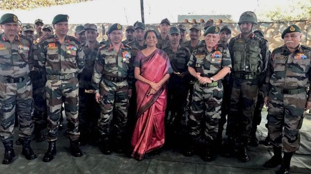 Defence minister Nirmala Sitharaman and Chief of the Army Staff General Bipin Rawat with the troops at one of the forward area posts in Jammu and Kashmir on Friday.(PTI Photo)