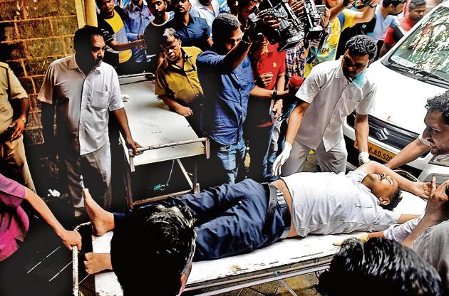 One of the 37 injured in the stampede at Elphinstone Railway station is brought to KEM Hospital on Friday.(Anshuman Poyrekar/HT Photo)