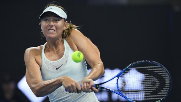 Maria Sharapova of Russia hits a return to Anastasija Sevastova of Latvia during their first round match at the China Open tennis tournament in Beijing on Sunday. (AFP) Maria Sharapova of Russia hits a return to Anastasija Sevastova of Latvia during their first round match at the China Open tennis tournament in Beijing on Sunday. (AFP)