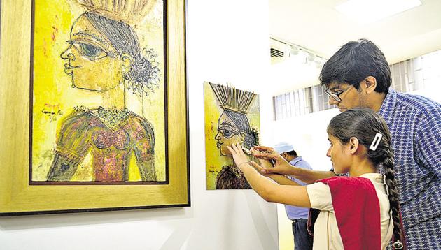 A feel of art for a visually impaired student at Punjab Kala Bhawan, Chandigarh. (HT Photo) A feel of art for a visually impaired student at Punjab Kala Bhawan, Chandigarh. (HT Photo)