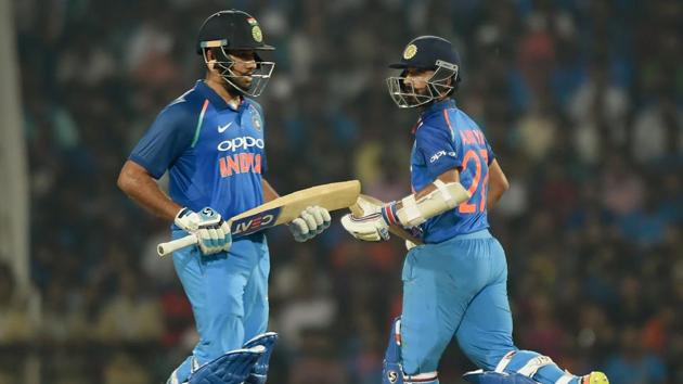 India openers Rohit Sharma and Ajinkya Rahane (R) put up a 124-run stand for the first wicket against Australia during the fifth ODI at the Vidarbha Cricket Association Stadium in Nagpur on Sunday.(AFP)