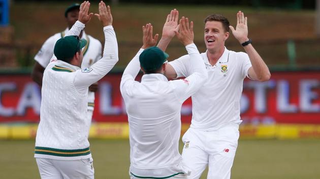 South African bowler Morne Morkel (L) celebrates the dismissal of Bangladeshi batsman Mominul Haque during the fourth day of the first Test on Sunday in Potchefstroom. (AFP) South African bowler Morne Morkel (L) celebrates the dismissal of Bangladeshi batsman Mominul Haque during the fourth day of the first Test on Sunday in Potchefstroom. (AFP)