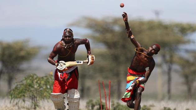 Joseph King’au of the Maasai Cricket Warriors bowls during a practice session against the lush landscape of Kenya. (Francois Nel / Getty Images) Joseph King’au of the Maasai Cricket Warriors bowls during a practice session against the lush landscape of Kenya. (Francois Nel / Getty Images)