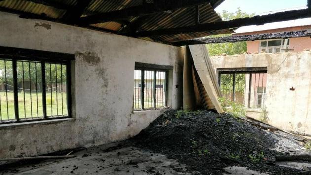 In August, the Jammu and Kashmir high court directed the government to complete the process of providing funds for reconstruction and repairing of the damaged schools within four weeks. The psychological wounds haven’t healed either. ‘It is inhuman to have students study in the same building where they are constantly reminded of the fact that an attempt was made to burn it. The least the government can do is to repair it,’ said a government school teacher in Batengoo, Anantnag district. (Neelam Pandey / HT Photo)
