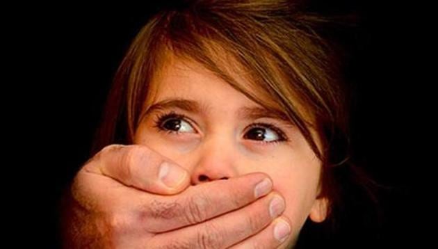 Local residents led by the girl’s father nabbed the co-accused even as he was sexually assaulting the unconscious child on a neighbourhood river bank. (Representative image) Local residents led by the girl’s father nabbed the co-accused even as he was sexually assaulting the unconscious child on a neighbourhood river bank. (Representative image)