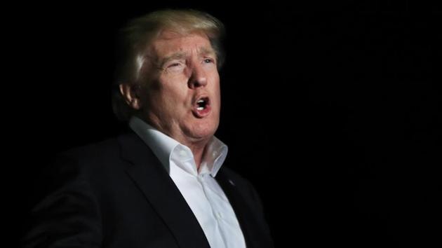 President Donald Trump speaks to reporters about Puerto Rico upon his return to the White House in Washington.(AP Photo)