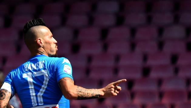 Napoli midfielder Marek Hamsik celebrates after scoring during the Italian Serie A football match vs Cagliari. (AFP) Napoli midfielder Marek Hamsik celebrates after scoring during the Italian Serie A football match vs Cagliari. (AFP)