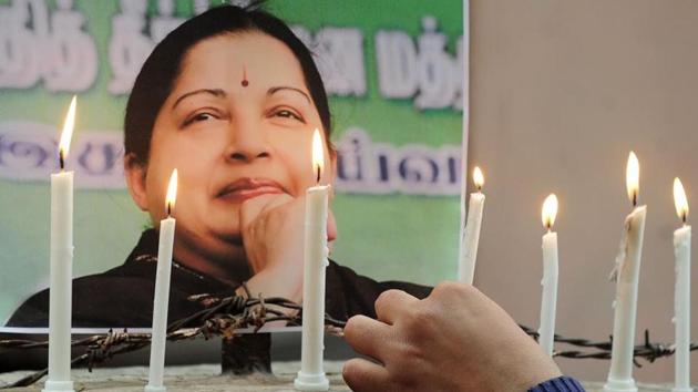 Supporters ofJayalalithaa Jayaraman light candles as they pay tribute after her death in Allahabad on December 6, 2016.(AFP File Photo)