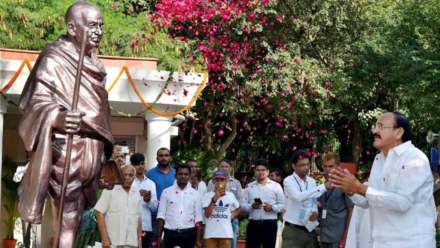 Vice President M. Venkaiah Naidu unveils a statue of Mahatma Gandhi on his 148th birth anniversary, at Rajghat Samadhi Complex, in New Delhi on Monday. (PTI) Vice President M. Venkaiah Naidu unveils a statue of Mahatma Gandhi on his 148th birth anniversary, at Rajghat Samadhi Complex, in New Delhi on Monday. (PTI)