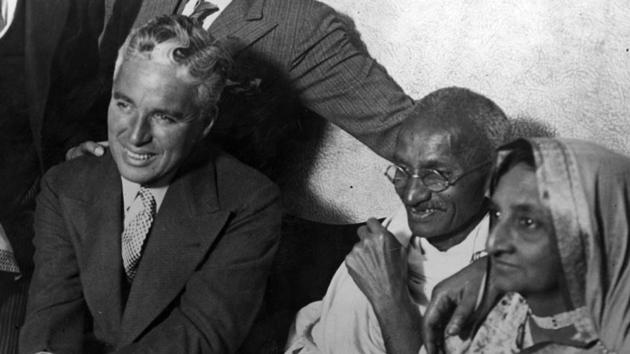 Mahatma Gandhi and his wife Kasturba Gandhi meet Hollywood actor Charlie Chaplin at the home of Dr. Katral in Canning Town, east London. (London Express / Getty Images)