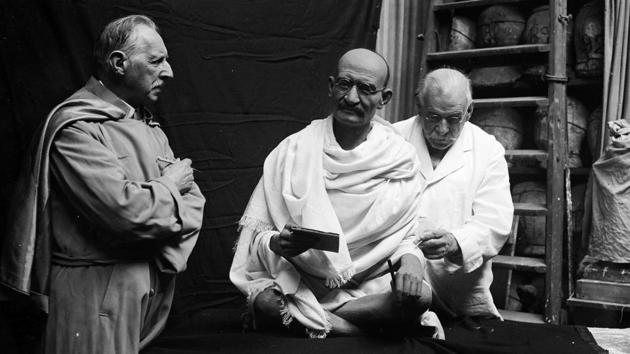 John Tussaud, son of Marie Tussaud working on a waxwork of Mahatma Gandhi for Madame Tussaud’s, 1931. (Fox Photos / Getty Images)