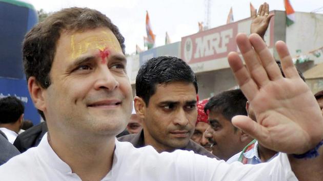Congress vice president Rahul Gandhi waves at supporters during his road show at Bhatiya village in Dwarka district of Gujarat. (PTI Photo) Congress vice president Rahul Gandhi waves at supporters during his road show at Bhatiya village in Dwarka district of Gujarat. (PTI Photo)