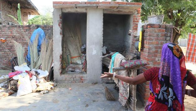 Firewood and other household goods are piled in a toilet and a bathroom at a house in a village in the outskirts of Jaipur. The house owner cited financial constraints in setting up a water tank and constructing the cess pit. (Himanshu Vyas/ Ht Photo) Firewood and other household goods are piled in a toilet and a bathroom at a house in a village in the outskirts of Jaipur. The house owner cited financial constraints in setting up a water tank and constructing the cess pit. (Himanshu Vyas/ Ht Photo)