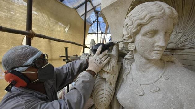 The work on this statue is almost complete. The team uses high-density steam to remove the coat of murk. The method is least invasive, as it does not use chemicals.(Kunal Patil/HT Photo)