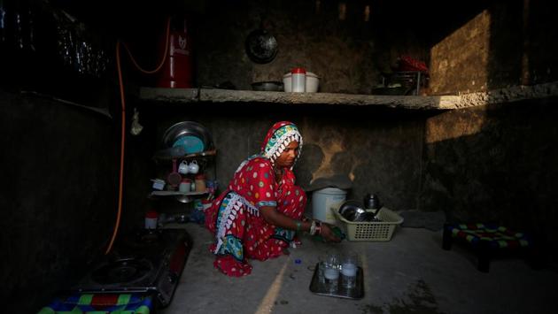 One of the first women to be trained successfully, Gulaban 25, is seen in the kitchen of her home in Islamkot, Tharparkar, Pakistan.  (Akhtar Soomro / REUTERS) 