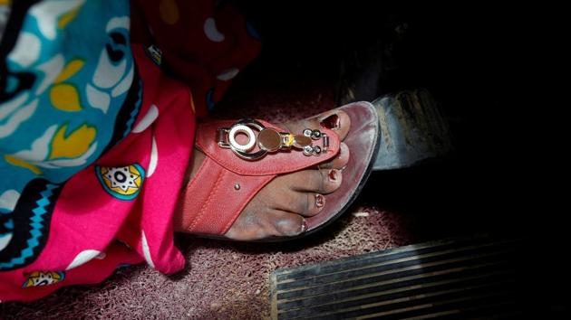 Gulaban applies the break pedal during a training session in Pakistan. “At the beginning, I was a bit nervous but now it’s normal to drive this dumper,” said Gulaban, clad in a pink and blue saree. (Akhtar Soomro / REUTERS) 