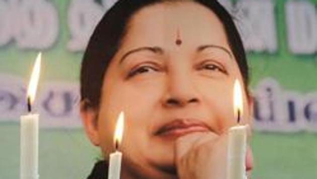 Supporters of Jayalalithaa Jayaraman, light candles as they pay tribute after her death, in Allahabad on December 6, 2016. (AFP File Photo) Supporters of Jayalalithaa Jayaraman, light candles as they pay tribute after her death, in Allahabad on December 6, 2016. (AFP File Photo)