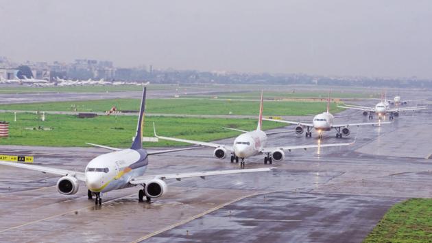 Aeroplanes lined at the runway in Mumbai airport. (HT File Photo) Aeroplanes lined at the runway in Mumbai airport. (HT File Photo)