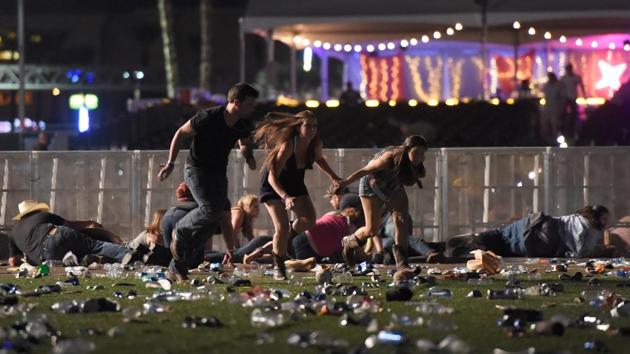 People run from the Route 91 Harvest country music festival after apparent gun fire was heard on October 1, 2017 in Las Vegas, Nevada. (AFP) People run from the Route 91 Harvest country music festival after apparent gun fire was heard on October 1, 2017 in Las Vegas, Nevada. (AFP)