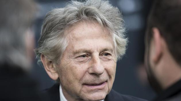 French-Polish film director Roman Polanski speaks with members of the media on the Green Carpet before the screening of Based on a True Story - D'apres une histoire vraie at the 13th Zurich Film Festival (ZFF) in Zurich.(AP)