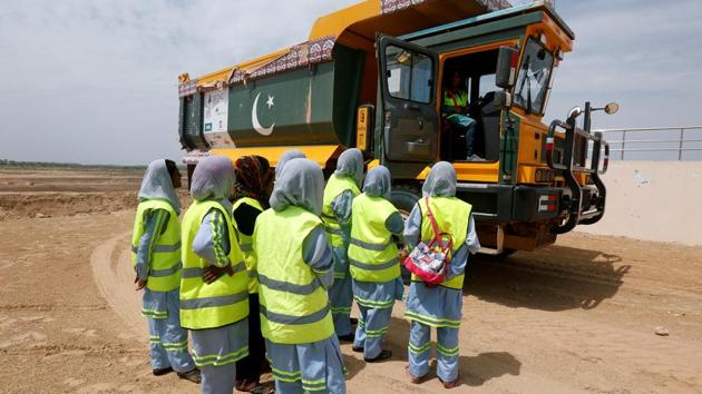 Once the women complete their training as truck-drivers, they will be moved to regular jobs within the Sindh Engro Coal Mining Company (SECMC) in Pakistan. (Akhtar Soomro / REUTERS)