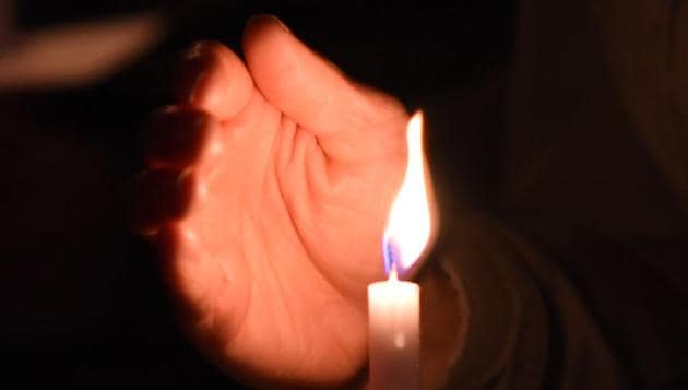 People attend a candlelight vigil at the University of Las Vegas student union in Las Vegas, Nevada. (AFP)