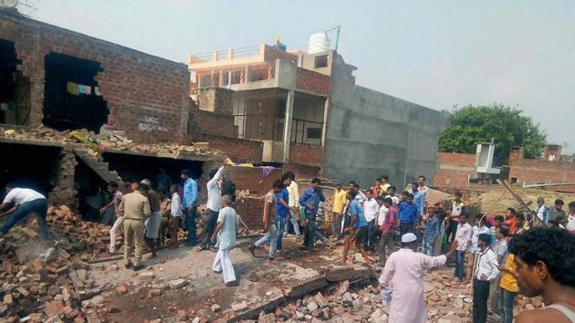 Rescue and relief works in progress after a two-storey building collapsed following an explosion, in Kanpur. (PTI Photo) Rescue and relief works in progress after a two-storey building collapsed following an explosion, in Kanpur. (PTI Photo)