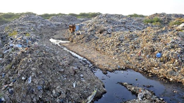 A report in August also stated that the compound wall was also found to have collapsed at various points of the dumping site.(HT FILE PHOTO)