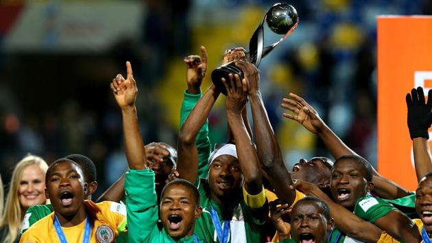 Kelechi Nwakali (No 10) of Nigeria lifts the trophy the FIFA Under-17 World Cup 2015, after they defeated Mali in the final at Estadio Sausalito in Chile on November 8, 2015.(FIFA via Getty Images)