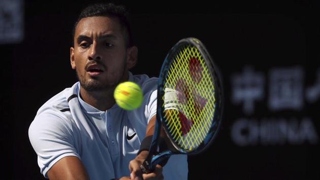 Nick Kyrgios returns a shot against Mischa Zverev during their men's singles match in the China Open tennis tournament at the Diamond Court in Beijing. Kyrgios won 3-6, 6-2, 6-2.(AP)