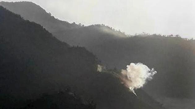 Smoke rises due to a mortar shell fired by Pakistani army near the line of control in Poonch sector on Monday.(PTI photo) Smoke rises due to a mortar shell fired by Pakistani army near the line of control in Poonch sector on Monday.(PTI photo)