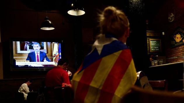 Spain’s King Felipe VI addresses the nation during a general strike in. The address by the head of state came two days after Catalonia’s regional government pressed ahead with a banned independence referendum. His dramatic intervention late Tuesday aimed to calm Spain’s deepest political crisis in decades but risked further fanning resentment and tensions in the region. (Pierre-Philippe Marcou / AFP) Spain’s King Felipe VI addresses the nation during a general strike in. The address by the head of state came two days after Catalonia’s regional government pressed ahead with a banned independence referendum. His dramatic intervention late Tuesday aimed to calm Spain’s deepest political crisis in decades but risked further fanning resentment and tensions in the region. (Pierre-Philippe Marcou / AFP)