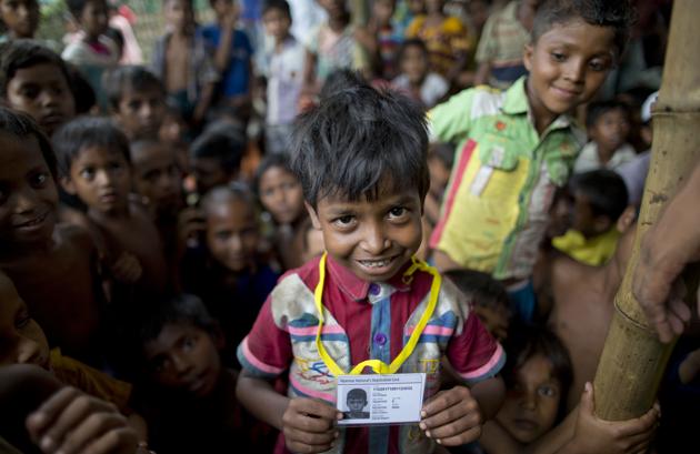 Mohammad Rofique, a Rohingya refugee, smiles after receiving an identity card from Bangladesh authorities at Kutupalong on October 1, 2017. (AP) Mohammad Rofique, a Rohingya refugee, smiles after receiving an identity card from Bangladesh authorities at Kutupalong on October 1, 2017. (AP)