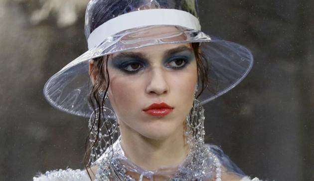 A model presents a creation for Chanel during the women's 2018 Spring/Summer ready-to-wear collection fashion show in Paris. (AFP) A model presents a creation for Chanel during the women's 2018 Spring/Summer ready-to-wear collection fashion show in Paris. (AFP)